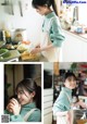 A woman in an apron preparing food in a kitchen.